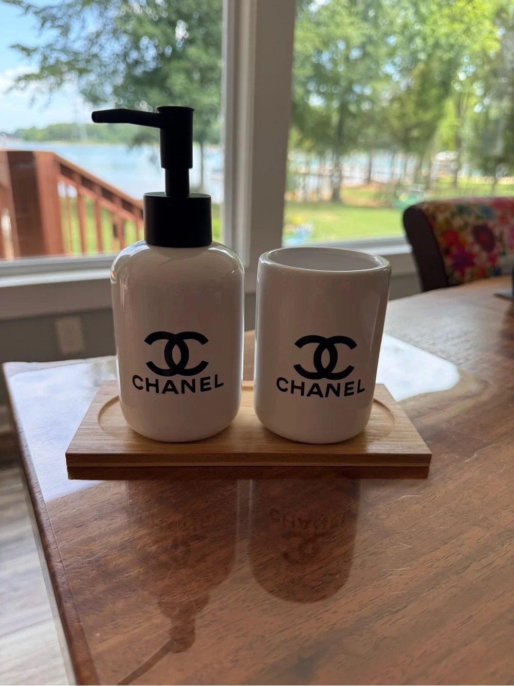 ChaneI White Ceramic Vanity Dispenser and Cup Set with Black Logo